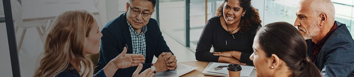 Group of people having an animated business meeting