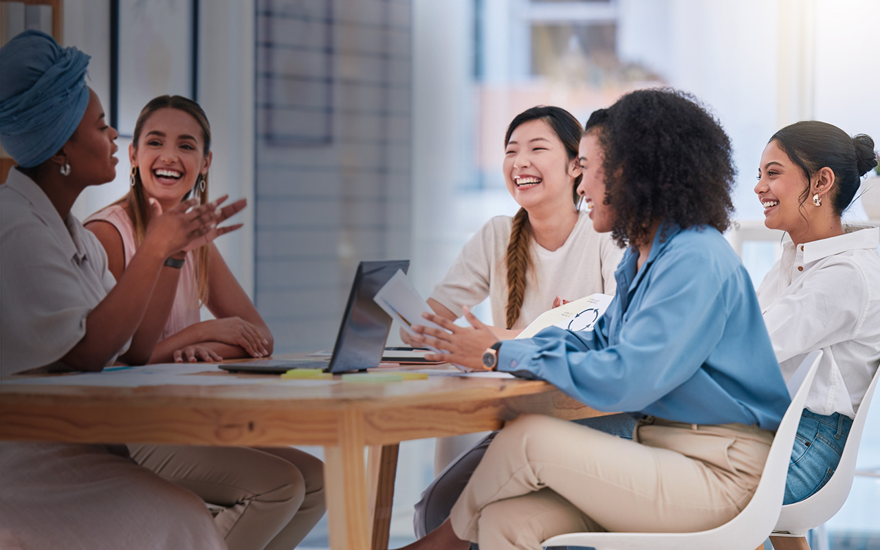 women of different ethnicity working together in an inclusive corporate environment