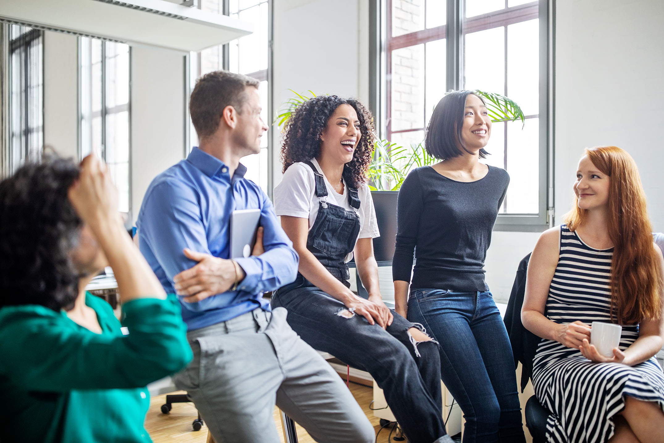 Employees chatting in the office
