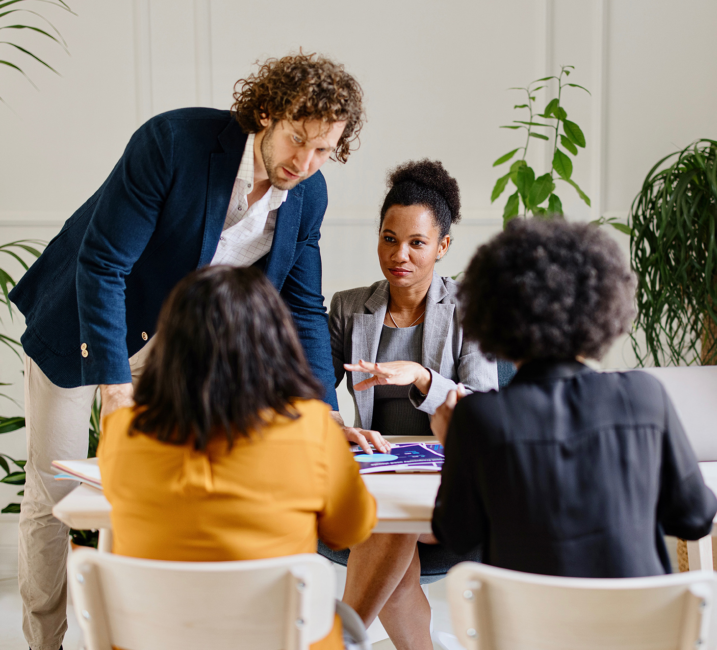 a group of people having a business meeting