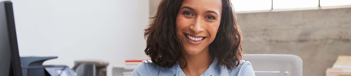 a women looking at the camera smiling